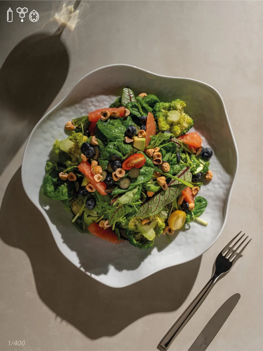 Salad with pheasant meat, blueberries, and broccoli